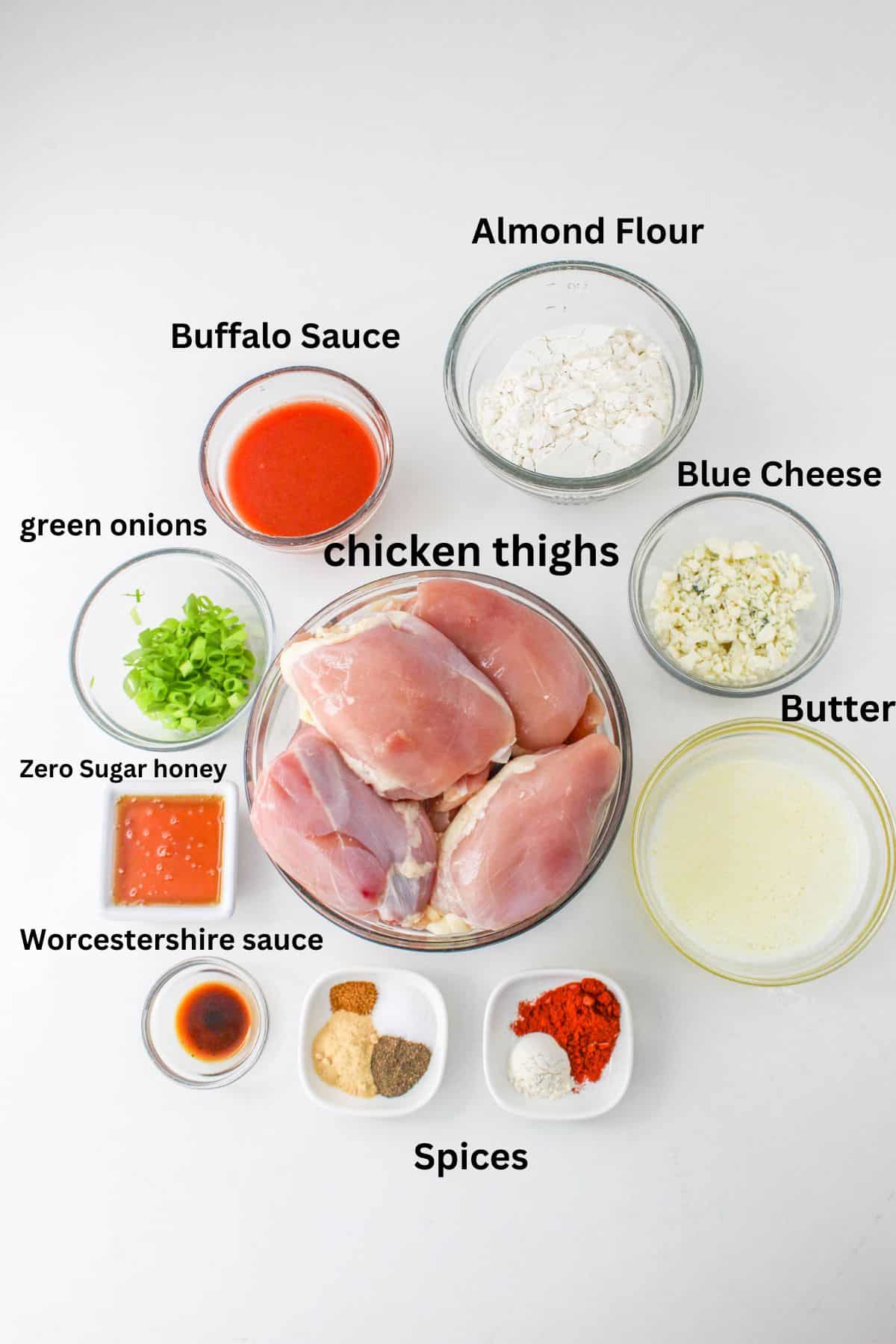 Buffalo Sauce, chicken thighs, Almond Flour, Blue Cheese, green onions, Zero Sugar honey, Butter, Worcestershire sauce,Spices