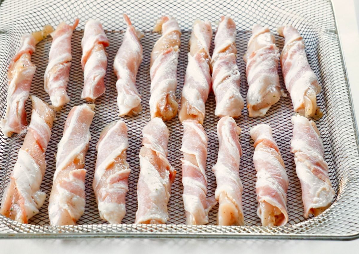 Chicken wrapped with back on air fryer rack