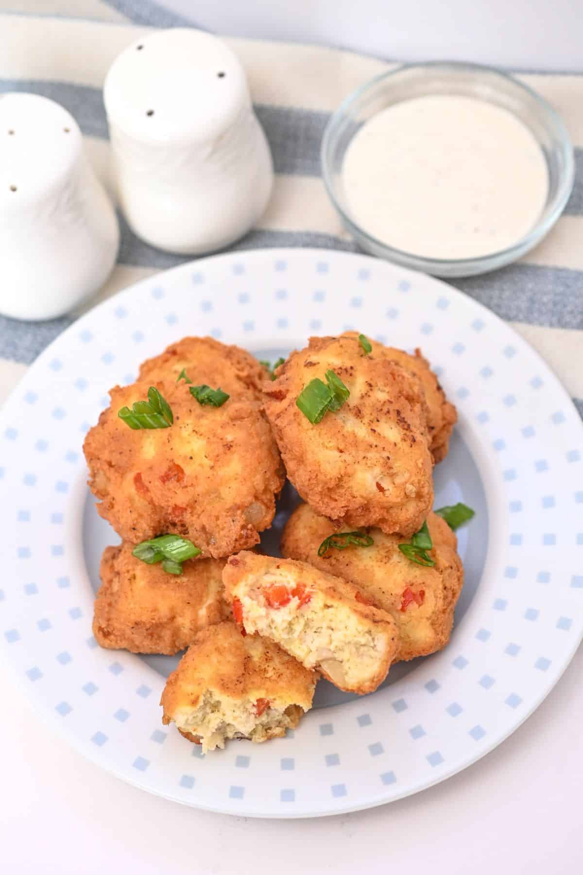 Keto Chicken Fritters on a plate with sauce
