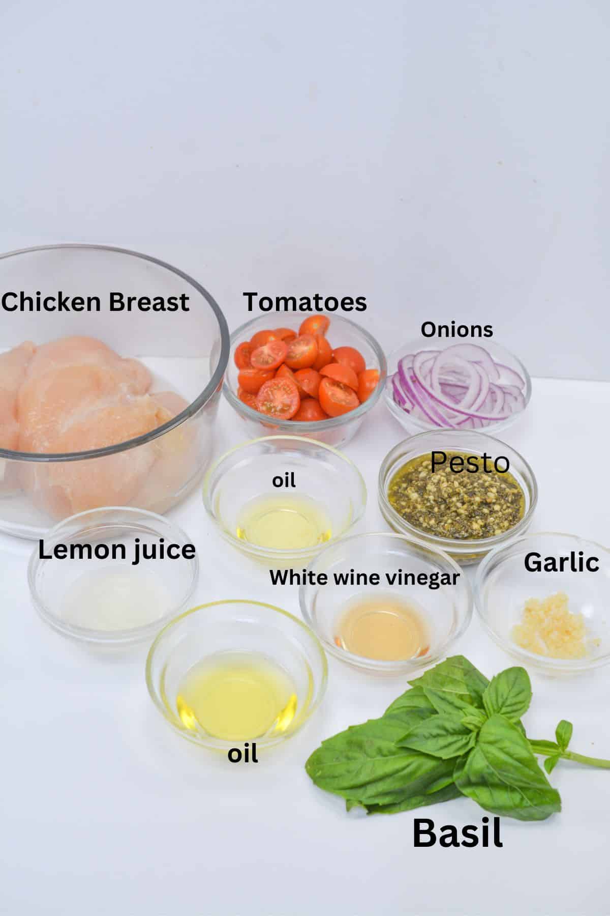 chicken, tomatoes, onion, oil, lemon juice, pesto, viniger, garlic, basil