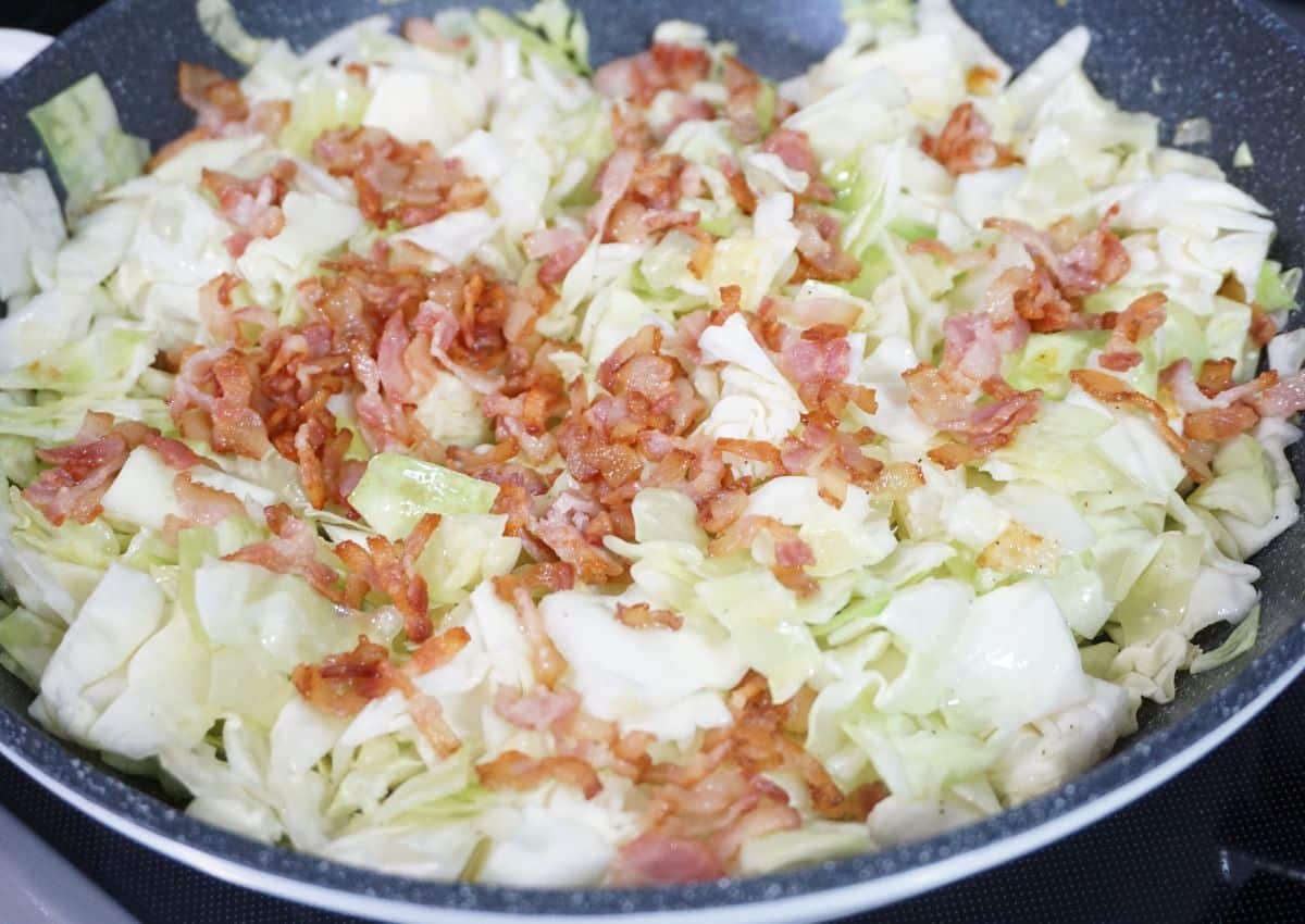 bacon and cabbage in a pan