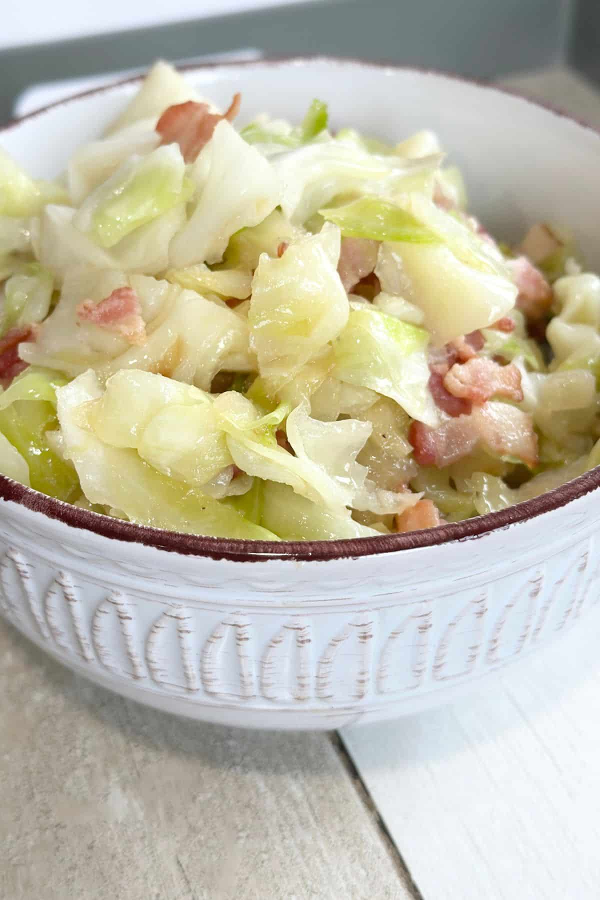 cabbage. onions, bacon in a bowl