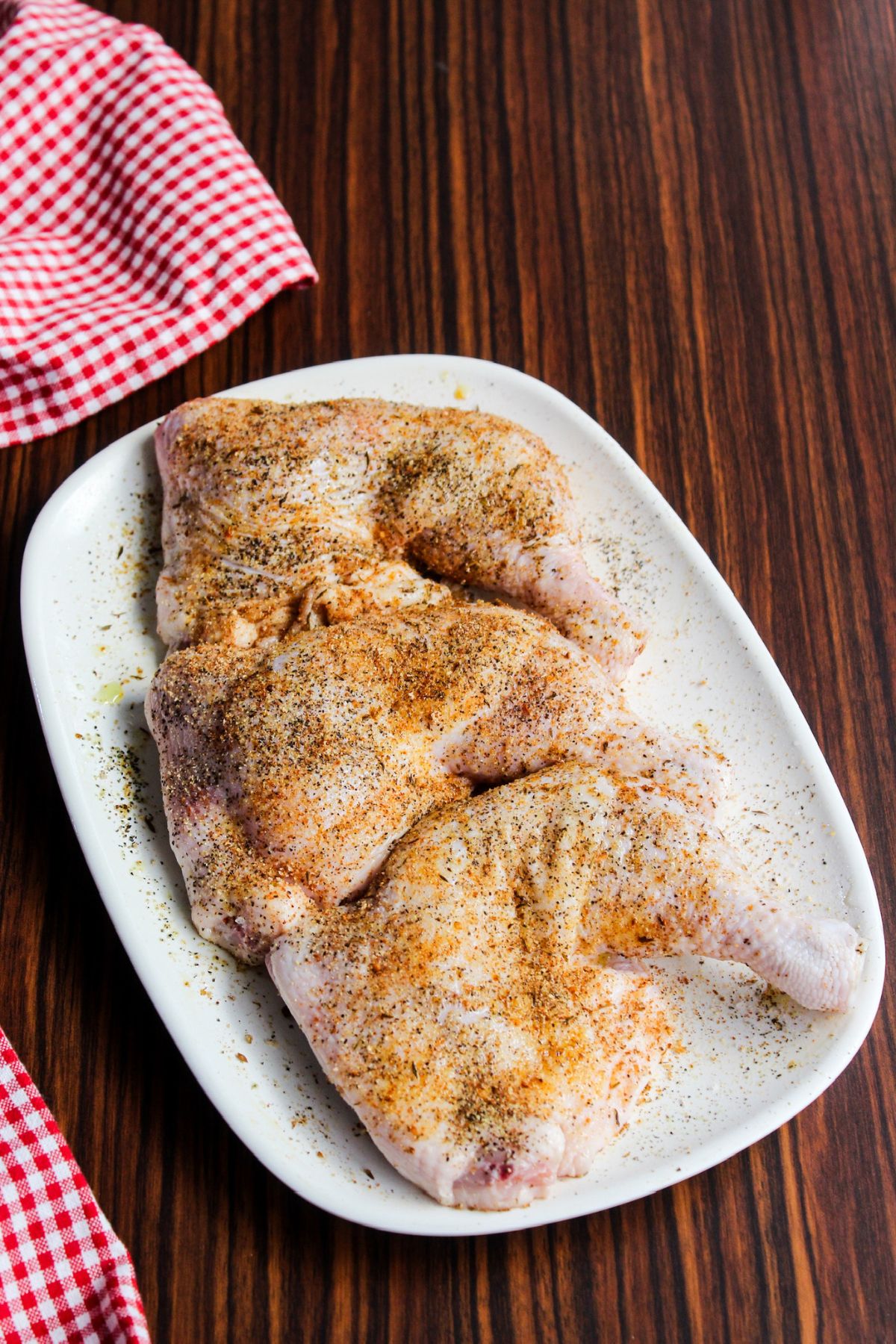 chicken with seasoning to maranate