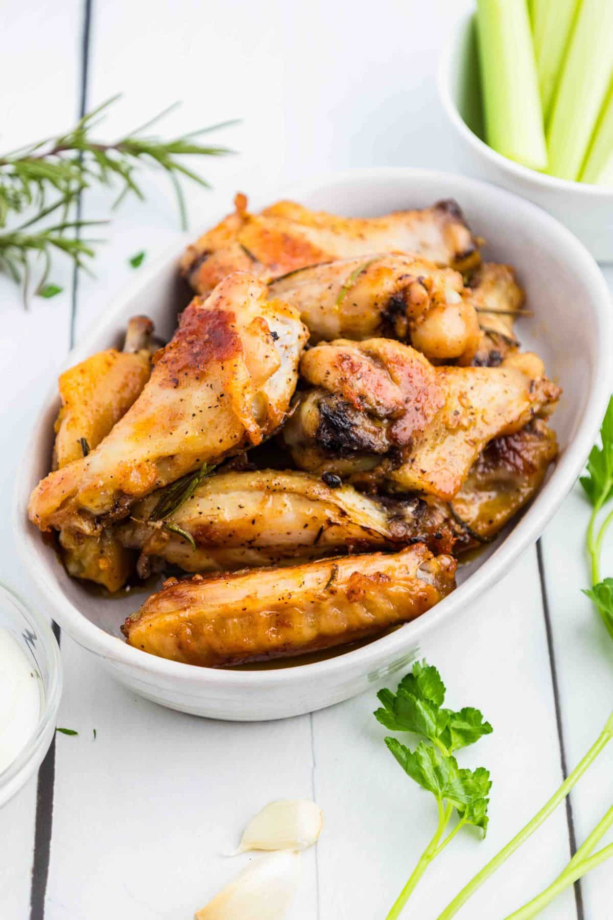 Garlic and herb chicken wings in bowl