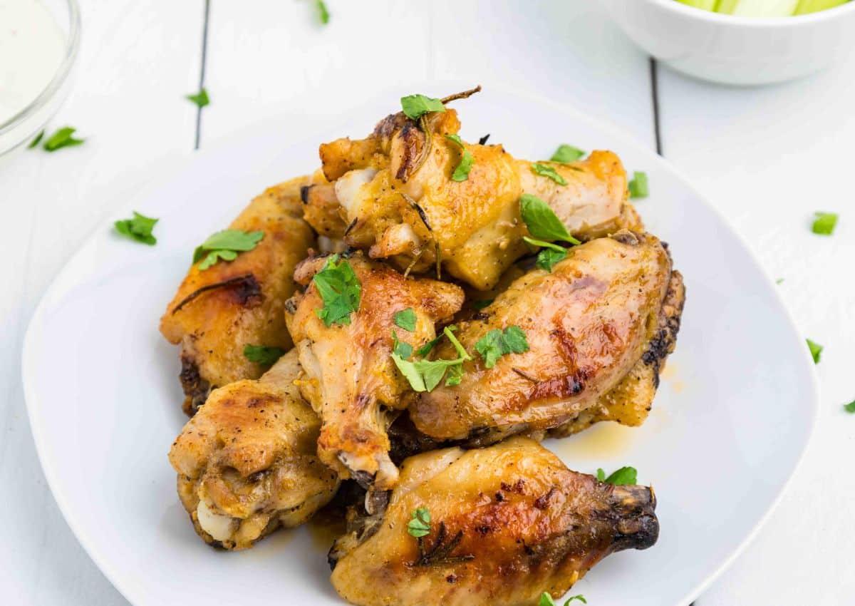 Garlic and herb chicken wings on plate
