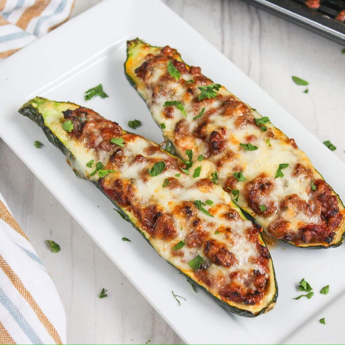 Zucchini ground beef boats on plate